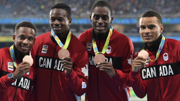 Akeem Haynes (left) with Aaron Brown, Brendon Rodney, and Andre De Grasse