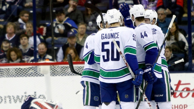 Vancouver Canucks celebrate goal, The Canadian Press Vancouver Canucks celebrate goal