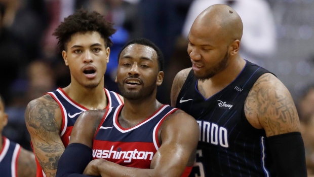 Kelly Oubre Jr. John Wall Maresse Speights, The Canadian Press Kelly Oubre Jr. John Wall Maresse Speights