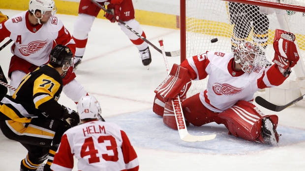 Evgeni Malkin Darren Helm Jimmy Howard, The Canadian Press Evgeni Malkin Darren Helm Jimmy Howard