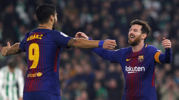 Luis Suarez, Lionel Messi, The Canadian Press Luis Suarez, Lionel Messi