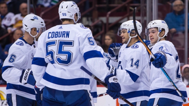 Lightning players celebrate, The Canadian Press Lightning players celebrate