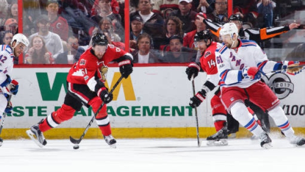 Mark Stone and Alex Burrows, Getty Images Mark Stone and Alex Burrows