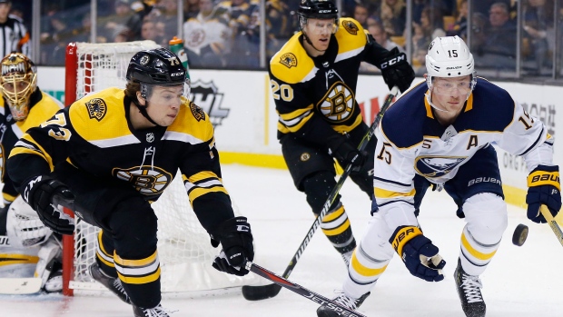 Charlie McAvoy and Jack Eichel , The Canadian Press Charlie McAvoy and Jack Eichel