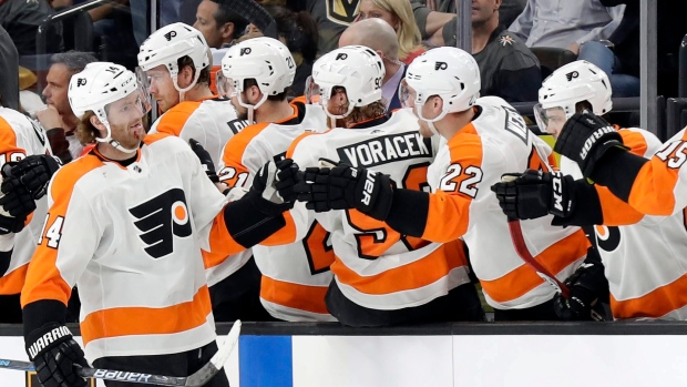 Sean Couturier celebrates