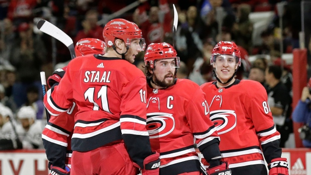 Justin Faulk and Hurricanes Celebrate , The Canadian Press Justin Faulk and Hurricanes Celebrate