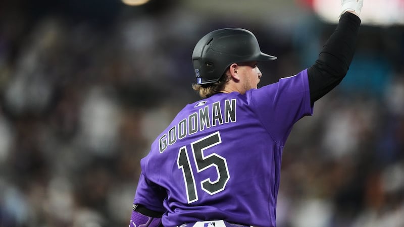 Goodman homers twice, drives in five in Rockies’ victory over Royals