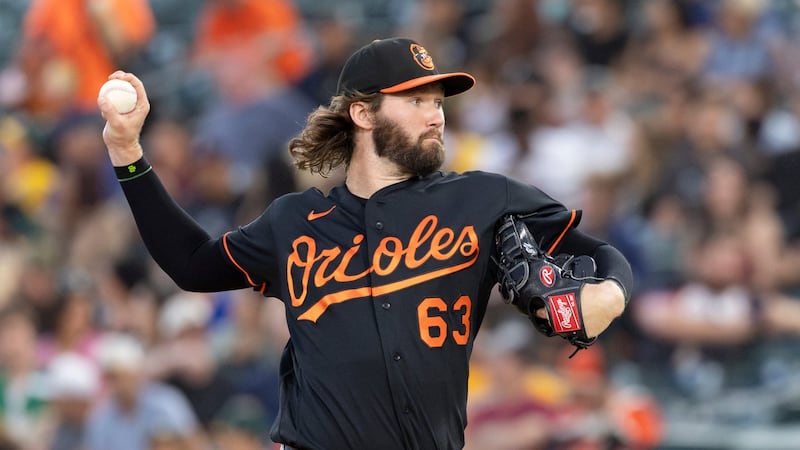 Mayo, Encarnacion-Strand lift Orioles past Athletics in extras