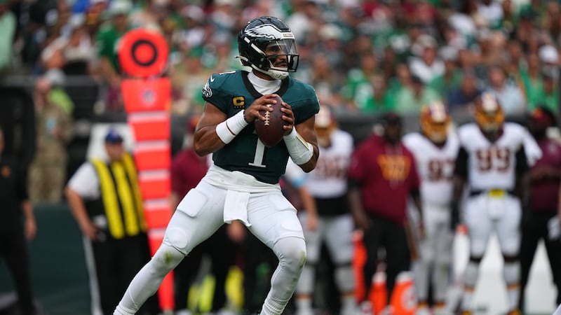 Hurts throws three TD passes, Eagles stuff Commanders’ late two-point try to seal win