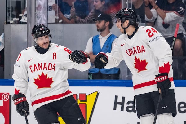 Canada surges past Slovakia with four-goal third period at men’s hockey worlds