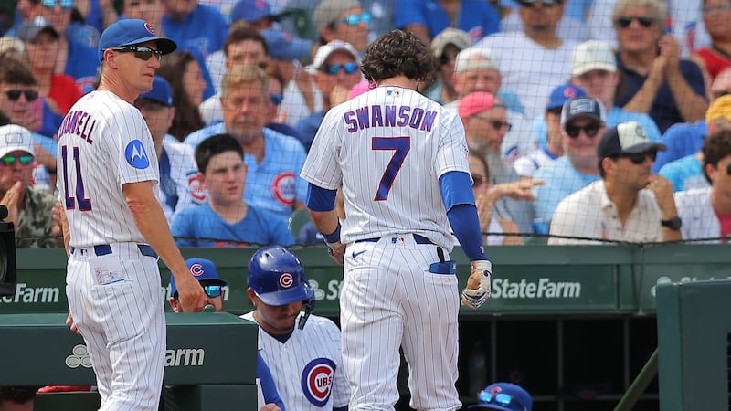 Cubs SS Swanson will miss about a month with left oblique strain