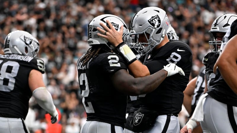 Cousins hits 301 career TD passes as Raiders open the season with win over Dolphins