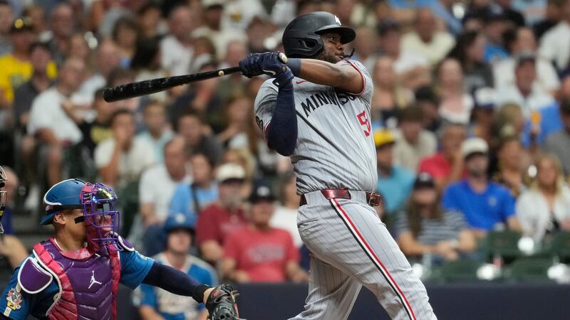 Bell sparks comeback as Twins rally to beat Brewers