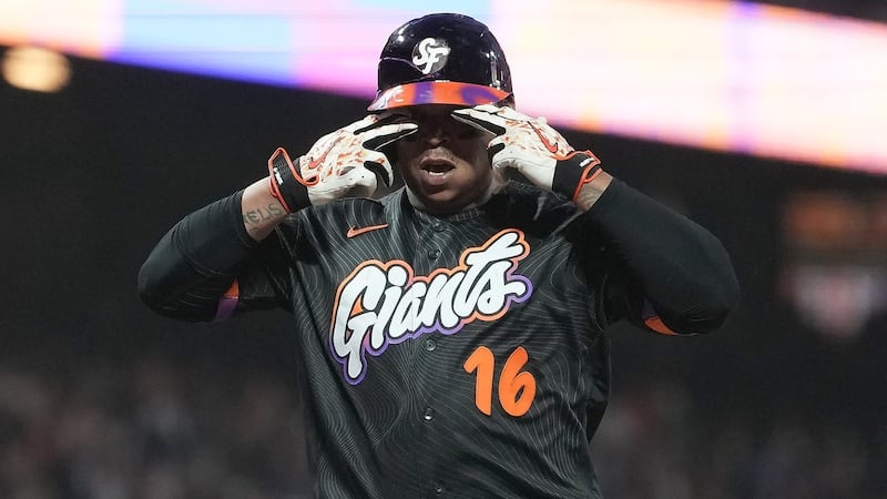 Devers bounces a homer into McCovey Cove as Giants beat Reds