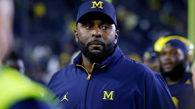 Ex-Michigan coach Moore gets probation for misdemeanors