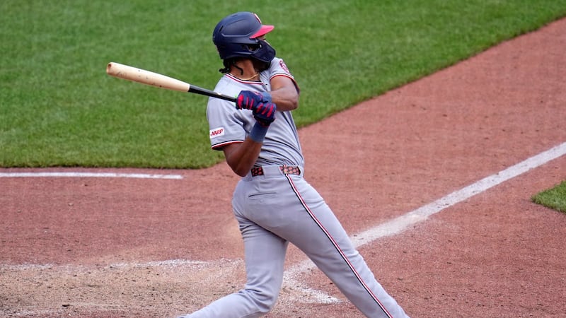 Wood singles to score automatic runner in the 10th, Nationals beat Pirates