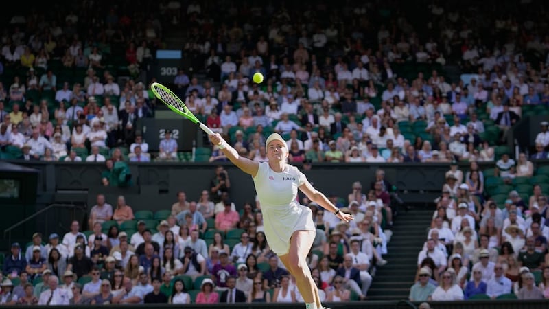Centre Court crowd at Wimbledon keeps one eye on England's World Cup match