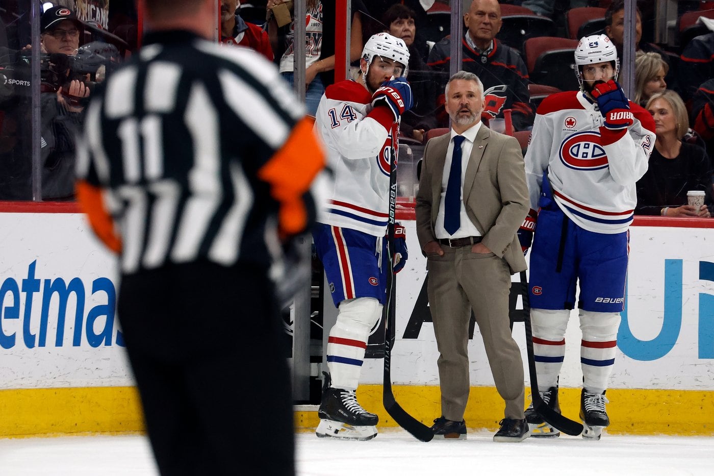 Montreal Canadiens players showing frustration on the bench