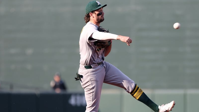Athletics SS Wilson goes on 10-day injured list with dislocated left shoulder