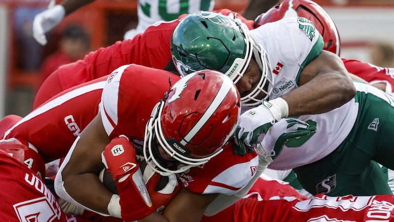 Roughriders survive Stampeders comeback attempt in wild overtime win