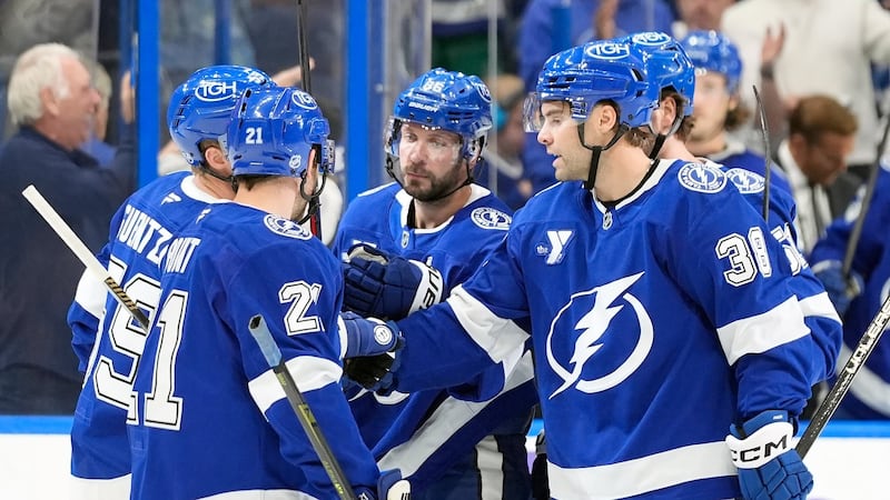 Lightning storm back from two-goal deficit to beat Canucks