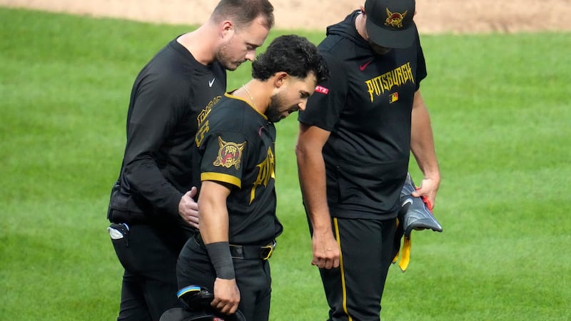 Pirates 3B Gonzales forced from game after being hit by pitch on helmet