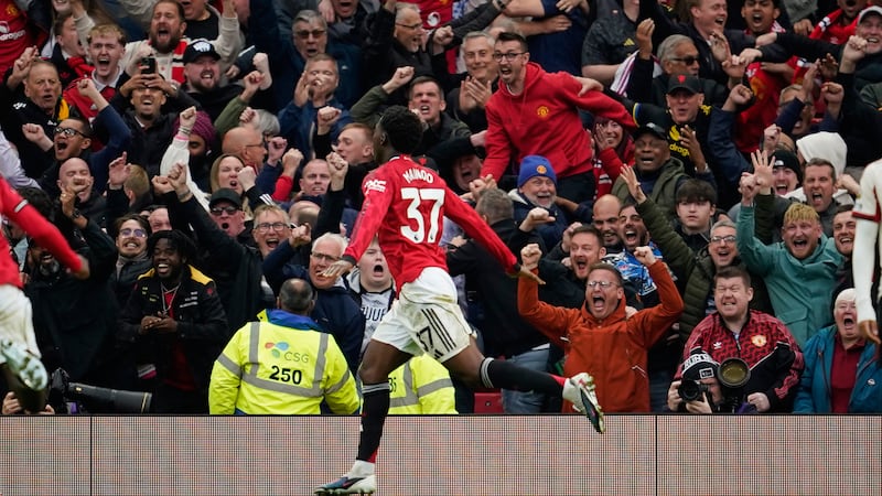United hold off Liverpool fightback to qualify for Champions League