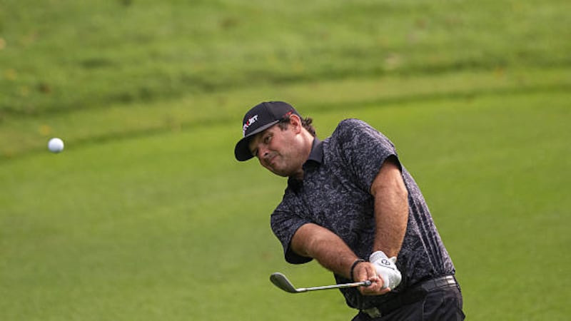 Reed on India cut line; McIlroy, Chacarra rounds halted by darkness in New Delhi