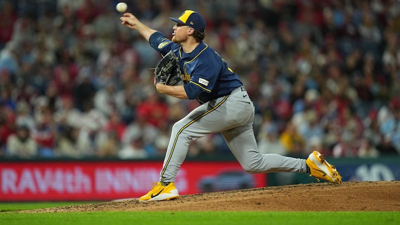 Brewers reach 100 wins for first time, slow Phillies’ playoff push in victory