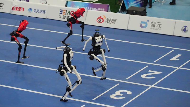 A robot sprinter shatters a 100-meter record again as sparks fly at China’s robot competition