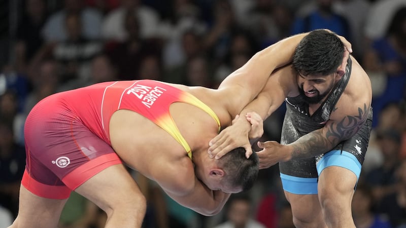 Olympic wrestler Dhesi suspended two years for anti-doping rule violation