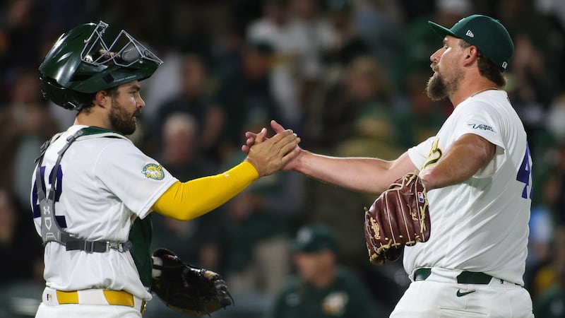 Langeliers, Wilson homer as Athletics beat Rangers to sit atop AL West for first time since 2021