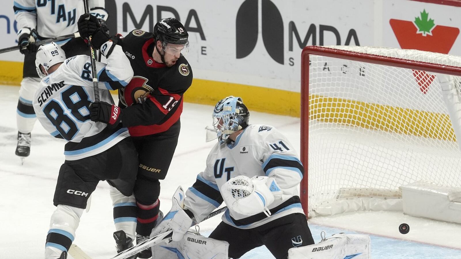 Spence scores his first with Senators as father looks on