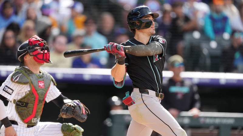 Carroll hits two homers, drives in three as Diamondbacks beat Rockies