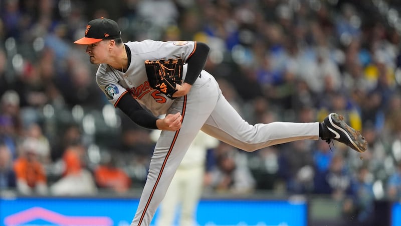 Dodgers acquire pitcher McDermott from Orioles for pitcher Perez