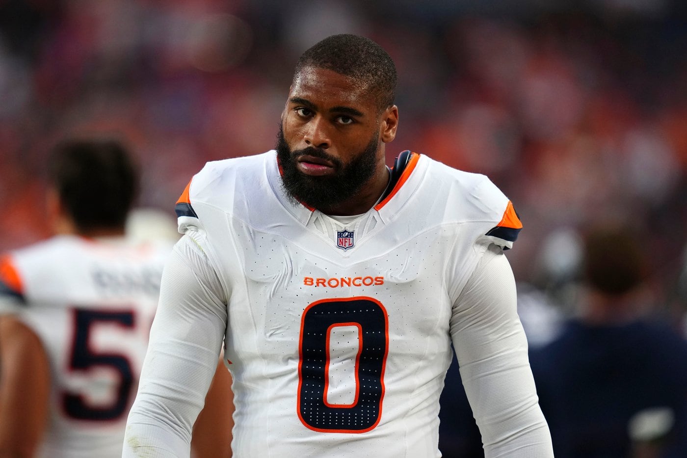 Denver Bronco Jonathon Cooper , facing strangulation charge , to start season on commissioner exempt list