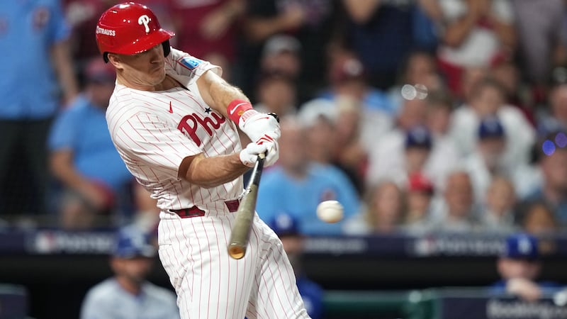 Struggling Phillies place catcher Realmuto on 10-day IL with back spasms