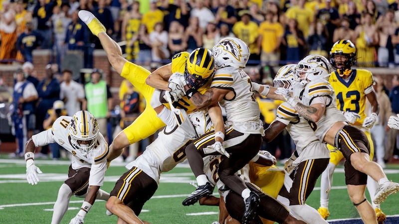 No. 16 Michigan catches second-chance Hail Mary, survives scare vs WMU