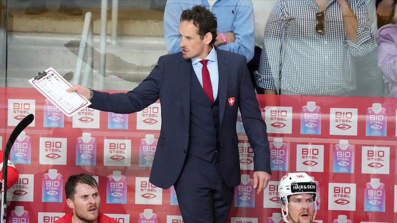 Hockey coach who admitted using a false COVID-19 vaccine certificate at the Olympics is fired