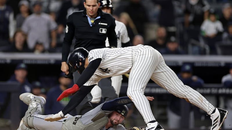 Lombard’s incredible slide, tie-breaking homer lift Yankees over Rays