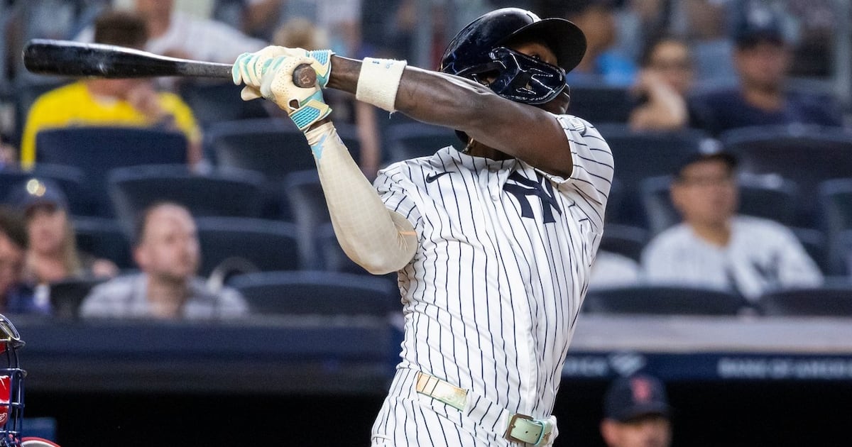 Photo: TSN New York Yankees' Jazz Chisholm Jr. hits a sacrifice fly, scoring Ben Rice, in the third inning during the second baseball