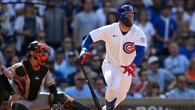 Busch singles in 10th, Cubs benefit from Giants error to win