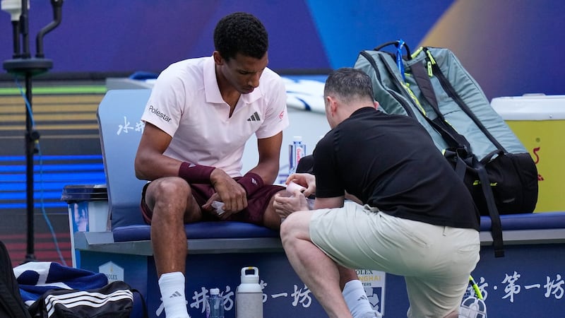 Canada's Auger-Aliassime retires with knee injury at Shanghai Masters