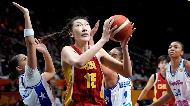 Xu powers China past Puerto Rico at World Cup to set up quarter-final matchup against France