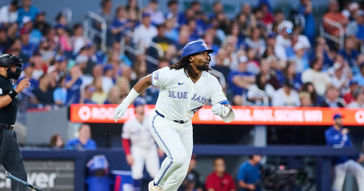 Photo: TSN Toronto Blue Jays' Charles McAdoo (26) rounds the bases after hitting a home run against the Boston Red Sox during fifth