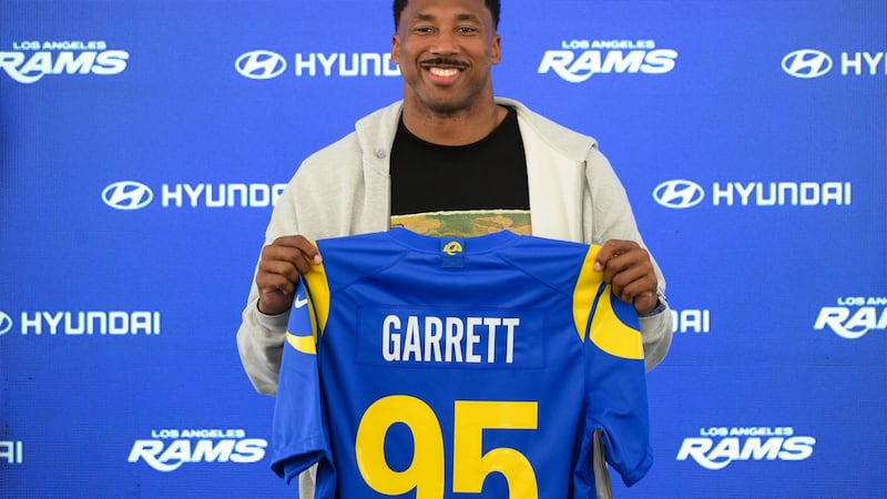 Garrett sees his trade to Rams as path to postseason success that has eluded him