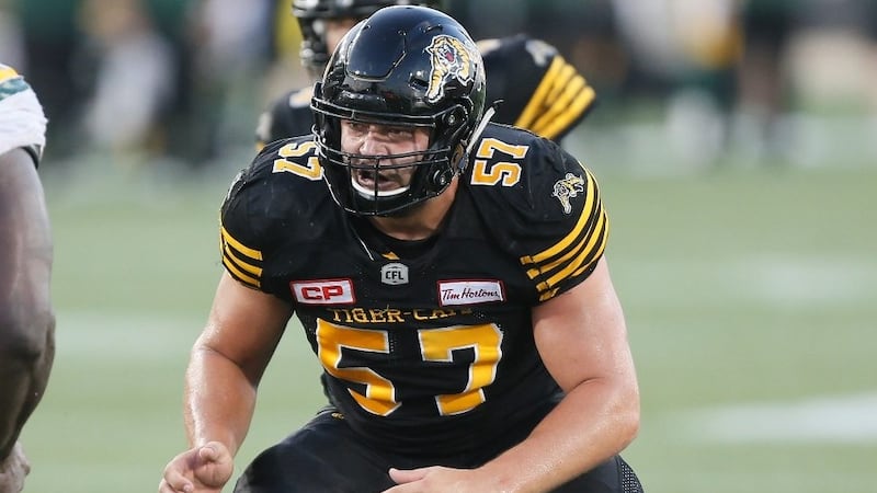 Tiger-Cats, All-CFL OL Revenberg agree to contract extension