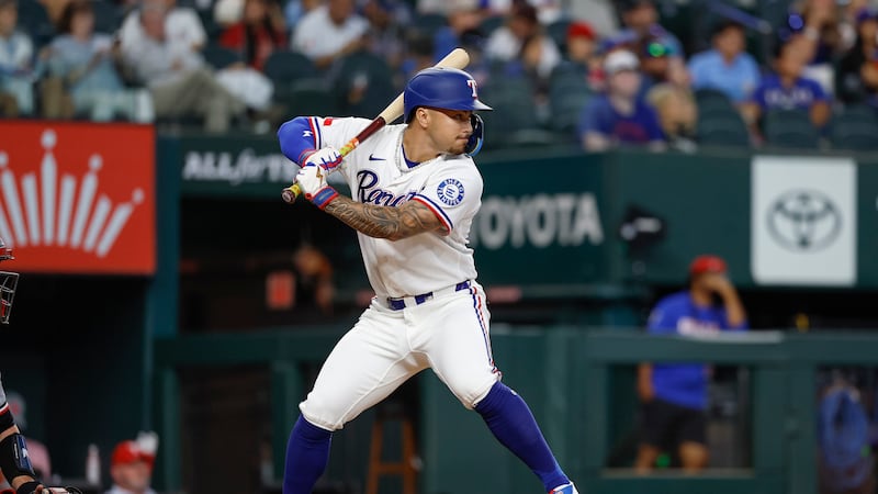 Rangers bring up minor league INF/OF Freeman and LHP Gonzales