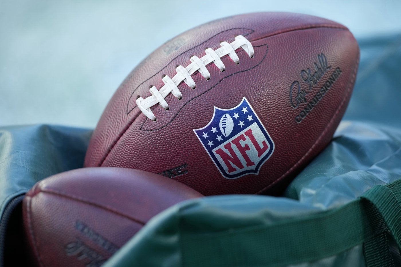 NFL suspends Cardinals executive indefinitely for violating league gambling policy , AP source says