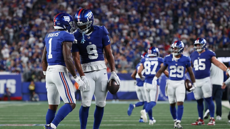 Giants’ offence rolls over Cowboys to give coach Harbaugh a win in his debut